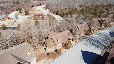 Looking for the perfect vacation retreat for your family to on Ledgestone Country Club and Golf Course in Missouri - for sale on GolfHomes.com, golf home, golf lot