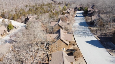 Looking for the perfect vacation retreat for your family to on Ledgestone Country Club and Golf Course in Missouri - for sale on GolfHomes.com, golf home, golf lot