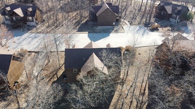 Looking for the perfect vacation retreat for your family to on Ledgestone Country Club and Golf Course in Missouri - for sale on GolfHomes.com, golf home, golf lot