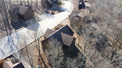 Looking for the perfect vacation retreat for your family to on Ledgestone Country Club and Golf Course in Missouri - for sale on GolfHomes.com, golf home, golf lot