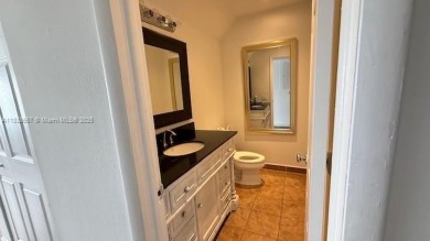 Spacious Corner  Unit townhouse features 4 bedrooms with 2 and on Davie Golf Club in Florida - for sale on GolfHomes.com, golf home, golf lot