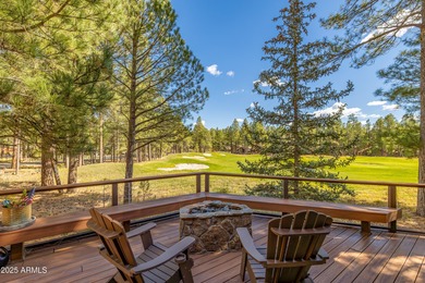 Escape to this pristine and well-cared-for cabin nestled among on Forest Highlands Golf Club - The Canyon in Arizona - for sale on GolfHomes.com, golf home, golf lot
