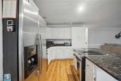 This beautiful Kiln Creek home has fantastic curb appeal and a on Kiln Creek Golf and Country Club in Virginia - for sale on GolfHomes.com, golf home, golf lot
