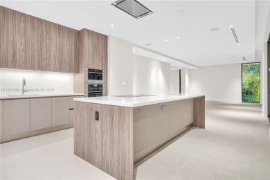 Experience Modern Elegance on the exclusive island of Key on Crandon Golf At Key Biscayne in Florida - for sale on GolfHomes.com, golf home, golf lot