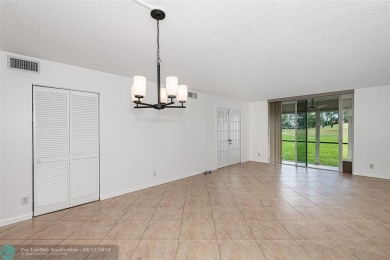 FIRST FLOOR WITH WASHER/DRYER INSIDE UNIT AND NO REC LEASE! on Hollybrook Golf and Tennis Club  in Florida - for sale on GolfHomes.com, golf home, golf lot