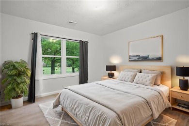 This beautiful Kiln Creek home has fantastic curb appeal and a on Kiln Creek Golf and Country Club in Virginia - for sale on GolfHomes.com, golf home, golf lot