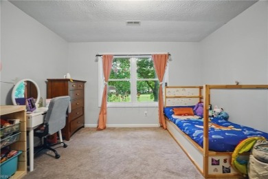 This beautiful Kiln Creek home has fantastic curb appeal and a on Kiln Creek Golf and Country Club in Virginia - for sale on GolfHomes.com, golf home, golf lot