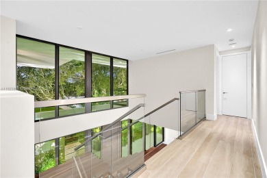 Experience Modern Elegance on the exclusive island of Key on Crandon Golf At Key Biscayne in Florida - for sale on GolfHomes.com, golf home, golf lot