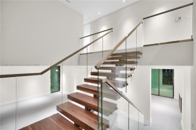Experience Modern Elegance on the exclusive island of Key on Crandon Golf At Key Biscayne in Florida - for sale on GolfHomes.com, golf home, golf lot