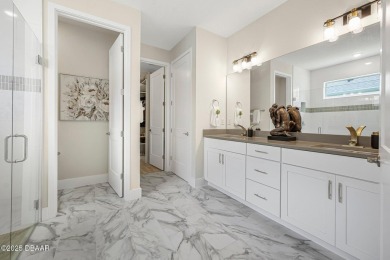 Welcome to 3029 Adrian Drive, a stunning upgraded home nestled on Halifax Plantation Golf Club in Florida - for sale on GolfHomes.com, golf home, golf lot