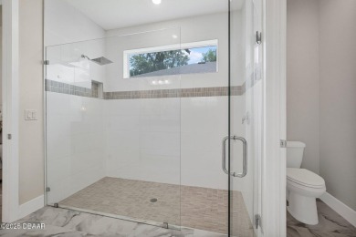 Welcome to 3029 Adrian Drive, a stunning upgraded home nestled on Halifax Plantation Golf Club in Florida - for sale on GolfHomes.com, golf home, golf lot