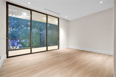 Experience Modern Elegance on the exclusive island of Key on Crandon Golf At Key Biscayne in Florida - for sale on GolfHomes.com, golf home, golf lot