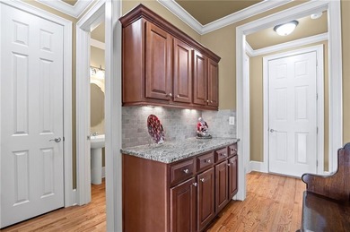 Luxury living in the prestigious Enclave section of Woodmont on Woodmont Golf and Country Club in Georgia - for sale on GolfHomes.com, golf home, golf lot