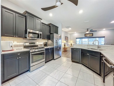 Welcome to this stunning 3-bedroom, 2-bath residence nestled in on Arlington Ridge Golf Club in Florida - for sale on GolfHomes.com, golf home, golf lot
