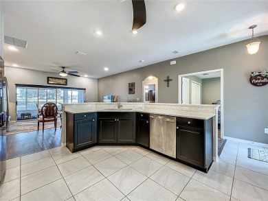Welcome to this stunning 3-bedroom, 2-bath residence nestled in on Arlington Ridge Golf Club in Florida - for sale on GolfHomes.com, golf home, golf lot