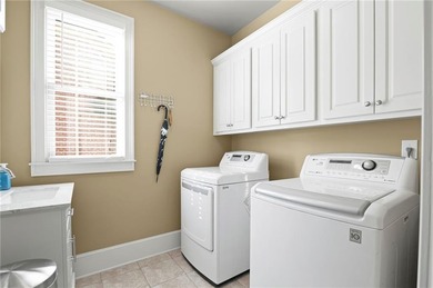 Luxury living in the prestigious Enclave section of Woodmont on Woodmont Golf and Country Club in Georgia - for sale on GolfHomes.com, golf home, golf lot