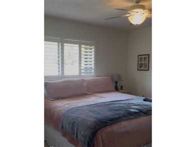 2-bedroom, 2-bathroom villa with a 1-car garage offers the ideal on Bird Bay Executive Golf Club in Florida - for sale on GolfHomes.com, golf home, golf lot