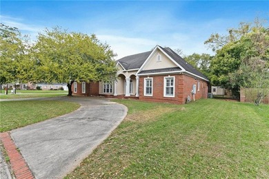 Custom-built home in the established Llanfair subdivision on Spring Hill College Golf Course in Alabama - for sale on GolfHomes.com, golf home, golf lot