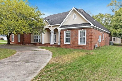 Custom-built home in the established Llanfair subdivision on Spring Hill College Golf Course in Alabama - for sale on GolfHomes.com, golf home, golf lot