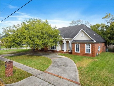 Custom-built home in the established Llanfair subdivision on Spring Hill College Golf Course in Alabama - for sale on GolfHomes.com, golf home, golf lot