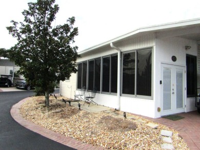 Located in the 55+ Regal Ridge Cooperative Community, this 2011 on Deer Creek RV Golf Resort in Florida - for sale on GolfHomes.com, golf home, golf lot