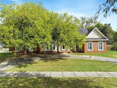 Custom-built home in the established Llanfair subdivision on Spring Hill College Golf Course in Alabama - for sale on GolfHomes.com, golf home, golf lot