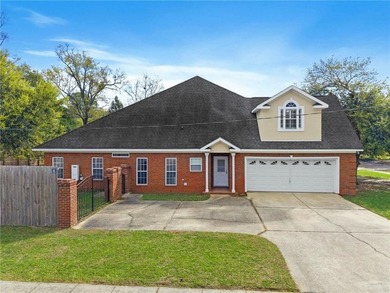 Custom-built home in the established Llanfair subdivision on Spring Hill College Golf Course in Alabama - for sale on GolfHomes.com, golf home, golf lot