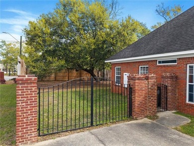 Custom-built home in the established Llanfair subdivision on Spring Hill College Golf Course in Alabama - for sale on GolfHomes.com, golf home, golf lot