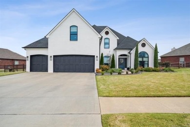 Welcome to your dream home, nestled along the lush fairways of on Bailey Ranch Golf Club in Oklahoma - for sale on GolfHomes.com, golf home, golf lot