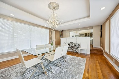 These views, this crisp modern design, the location on #9, glass on TPC at Sawgrass in Florida - for sale on GolfHomes.com, golf home, golf lot