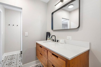 Charming coastal bungalow just steps from the Intracoastal in on Lake Worth Municipal Golf Course in Florida - for sale on GolfHomes.com, golf home, golf lot