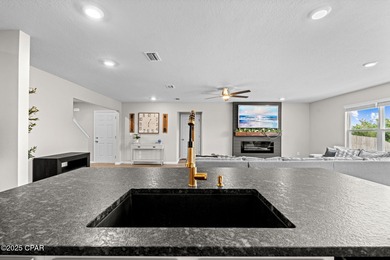 This exquisite 5-bedroom, 4-bathroom home boasts 4,128 sq/ft of on Bay Dunes in Florida - for sale on GolfHomes.com, golf home, golf lot