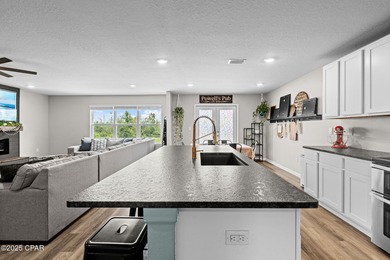 This exquisite 5-bedroom, 4-bathroom home boasts 4,128 sq/ft of on Bay Dunes in Florida - for sale on GolfHomes.com, golf home, golf lot