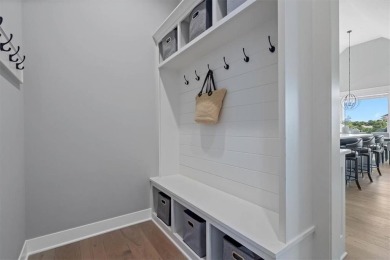 This 4-bedroom, 4-bath reverse 1.5-story is packed with upgrades on Heritage Park Golf Course in Kansas - for sale on GolfHomes.com, golf home, golf lot