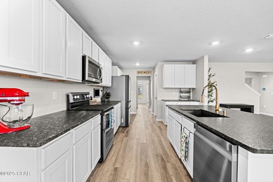 This exquisite 5-bedroom, 4-bathroom home boasts 4,128 sq/ft of on Bay Dunes in Florida - for sale on GolfHomes.com, golf home, golf lot