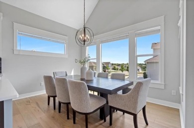 This 4-bedroom, 4-bath reverse 1.5-story is packed with upgrades on Heritage Park Golf Course in Kansas - for sale on GolfHomes.com, golf home, golf lot