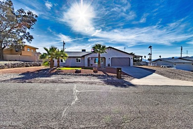 Welcome home to 2850 Edgewood Drive, a thoughtfully updated on London Bridge Golf Course in Arizona - for sale on GolfHomes.com, golf home, golf lot