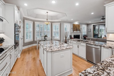 Welcome to 704 Squire Lane, where timeless elegance meets modern on Porters Neck Country Club in North Carolina - for sale on GolfHomes.com, golf home, golf lot