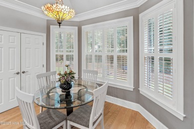 Welcome to 704 Squire Lane, where timeless elegance meets modern on Porters Neck Country Club in North Carolina - for sale on GolfHomes.com, golf home, golf lot