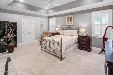 Welcome to 704 Squire Lane, where timeless elegance meets modern on Porters Neck Country Club in North Carolina - for sale on GolfHomes.com, golf home, golf lot