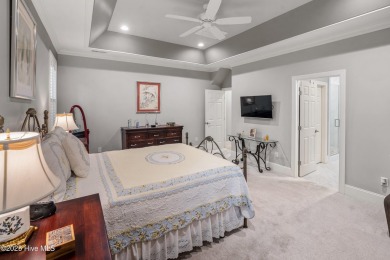 Welcome to 704 Squire Lane, where timeless elegance meets modern on Porters Neck Country Club in North Carolina - for sale on GolfHomes.com, golf home, golf lot