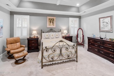 Welcome to 704 Squire Lane, where timeless elegance meets modern on Porters Neck Country Club in North Carolina - for sale on GolfHomes.com, golf home, golf lot