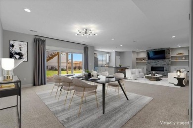This 4-bedroom, 4-bath reverse 1.5-story is packed with upgrades on Heritage Park Golf Course in Kansas - for sale on GolfHomes.com, golf home, golf lot