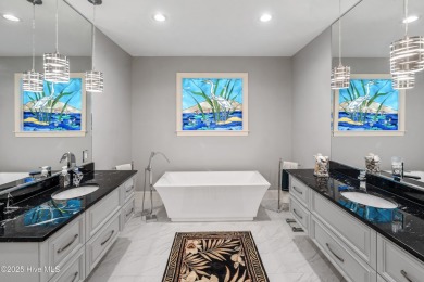 Welcome to 704 Squire Lane, where timeless elegance meets modern on Porters Neck Country Club in North Carolina - for sale on GolfHomes.com, golf home, golf lot