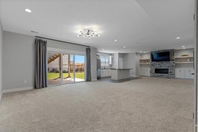 This 4-bedroom, 4-bath reverse 1.5-story is packed with upgrades on Heritage Park Golf Course in Kansas - for sale on GolfHomes.com, golf home, golf lot