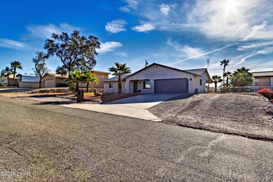 Welcome home to 2850 Edgewood Drive, a thoughtfully updated on London Bridge Golf Course in Arizona - for sale on GolfHomes.com, golf home, golf lot