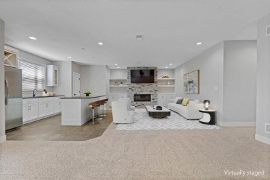 This 4-bedroom, 4-bath reverse 1.5-story is packed with upgrades on Heritage Park Golf Course in Kansas - for sale on GolfHomes.com, golf home, golf lot