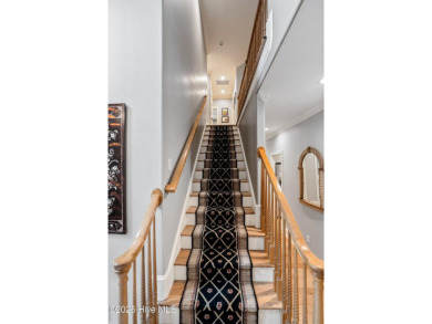 Welcome to 704 Squire Lane, where timeless elegance meets modern on Porters Neck Country Club in North Carolina - for sale on GolfHomes.com, golf home, golf lot