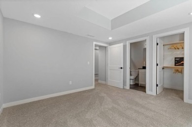 This 4-bedroom, 4-bath reverse 1.5-story is packed with upgrades on Heritage Park Golf Course in Kansas - for sale on GolfHomes.com, golf home, golf lot