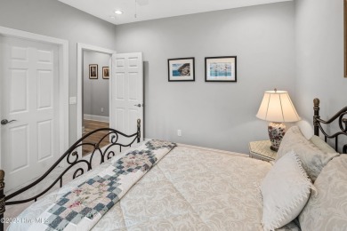 Welcome to 704 Squire Lane, where timeless elegance meets modern on Porters Neck Country Club in North Carolina - for sale on GolfHomes.com, golf home, golf lot